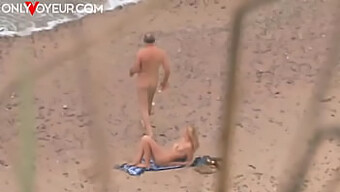 Hidden Cameras Capture Intimate Moments Of A Mature Man And A Beautiful Woman On The Beach